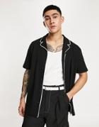 Asos Design Relaxed Polo In Black With Revere And White Tipping Details