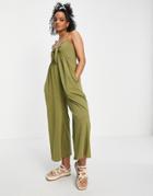Asos Design Tie Front Sleeveless Swing Jumpsuit In Khaki-green