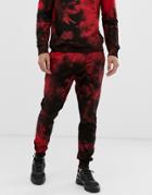 Criminal Damage Tie Dye Sweatpants In Black And Red