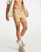 Asos Design Skinny Chino Shorter Shorts With Pin Tuck And Elastic Waist In Mustard Yellow