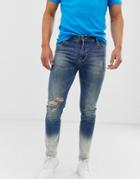 Asos Design Skinny Jeans In Ombre Bleach Wash With Knee Rip-blue