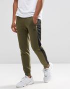 Puma Tapered Joggers In Green - Green