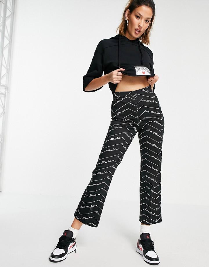 Love Moschino Allover Logo Print High Waist Pants In Black