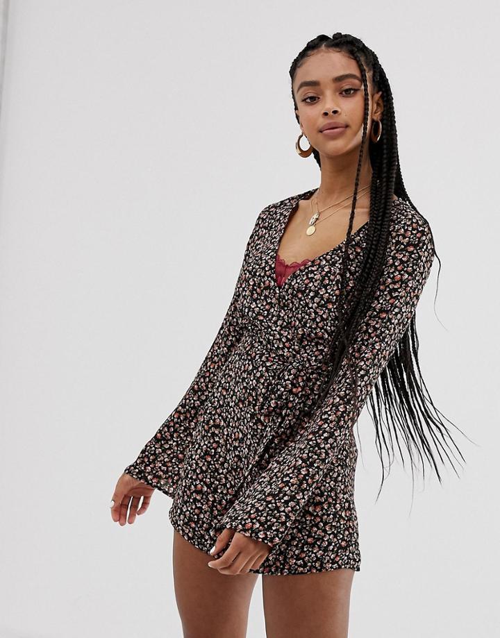 Wild Honey Long Sleeved Romper In Ditsy Floral - Black