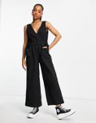 Asos Design Twill Sleeveless Channel Tie Waist Jumpsuit In Black
