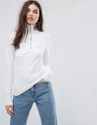 Ellesse Long Sleeve Top With Half Zip And Neck Logo - White