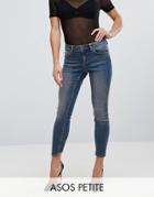 Asos Petite Whitby Skinny Low Rise Jeans In Dita Tinted Mid Wash With Reverse Stepped Hem - Blue