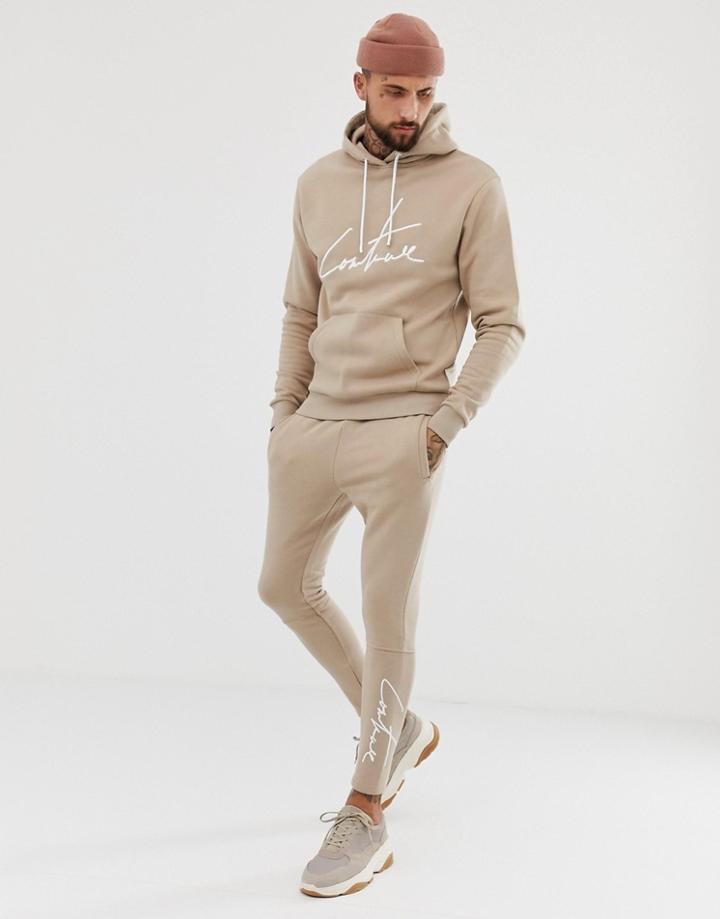 The Couture Club Skinny Joggers With Signature Logo In Beige - Gray