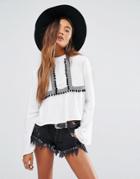 Young Bohemians High Neck Top With Wide Sleeves And Pom Pom Trim - White