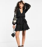 Asos Design Petite Blouson Sleeve Tiered Mini Dress With Cross Stitch Embroidery Detail And Tie In Black
