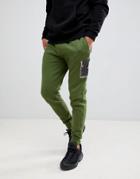 Asos Design Skinny Sweatpants With Camo Panels And Ma1 Pocket-green