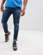 Asos Design Super Skinny Jeans In Dark Wash Blue With Abrasions