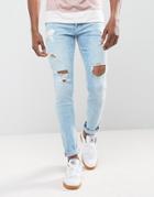 Asos Skinny Jeans In Light Wash Blue With Heavy Rips - Blue