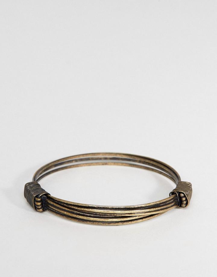 Icon Brand Bangle Bracelet In Burnished Gold - Gold