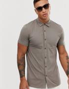 Asos Design Muscle Fit Button Through Jersey Polo In Beige