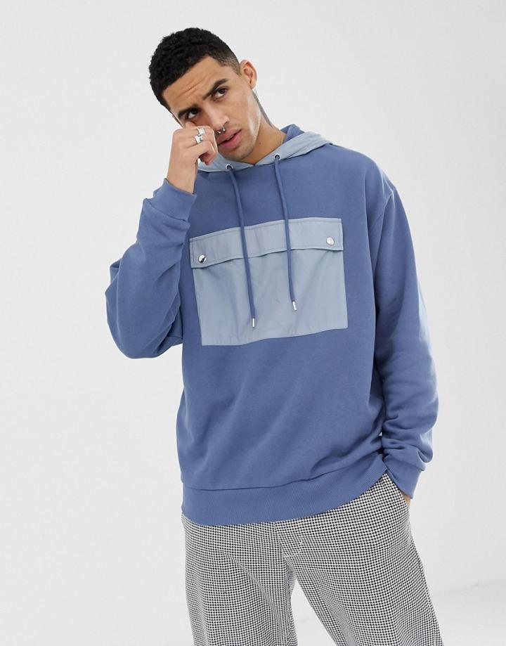 Asos Design Oversized Hoodie With Contrast Woven Pocket And Hood In Blue - Blue