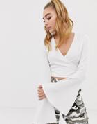 Prettylittlething Flare Sleeve Ribbed Wrap Tie Crop Top In White - Black