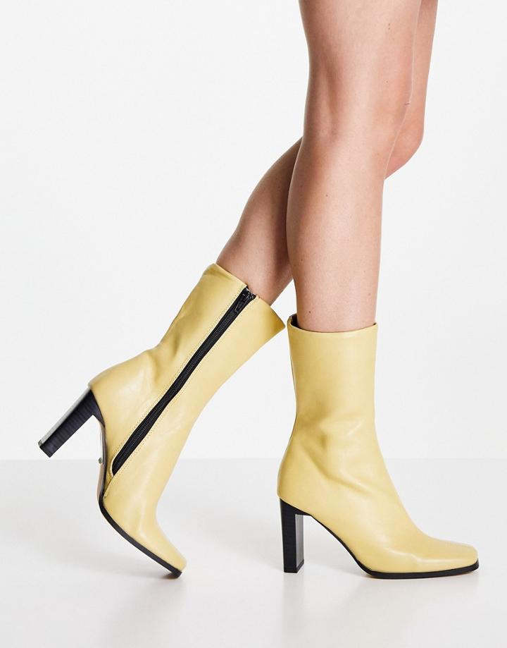 Asos Design Expand High-heeled Boots With Set Back Heel In Lemon-yellow