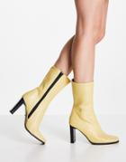 Asos Design Expand High-heeled Boots With Set Back Heel In Lemon-yellow