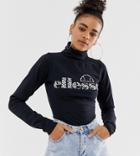 Ellesse Long Sleeve Fitted Top With High Neck And Spot Front Logo - Black