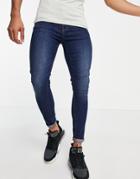 Asos Design Spray On Jeans With Power Stretch In Dark Wash-blues