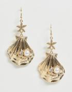 Asos Design Earrings In Sea Shell Design With Pearl In Gold