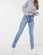 Levi's 724 High Rise Straight Leg Jeans In Mid Wash Blue