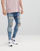 Siksilk Muscle Fit Drop Crotch Jeans With Distressing - Blue