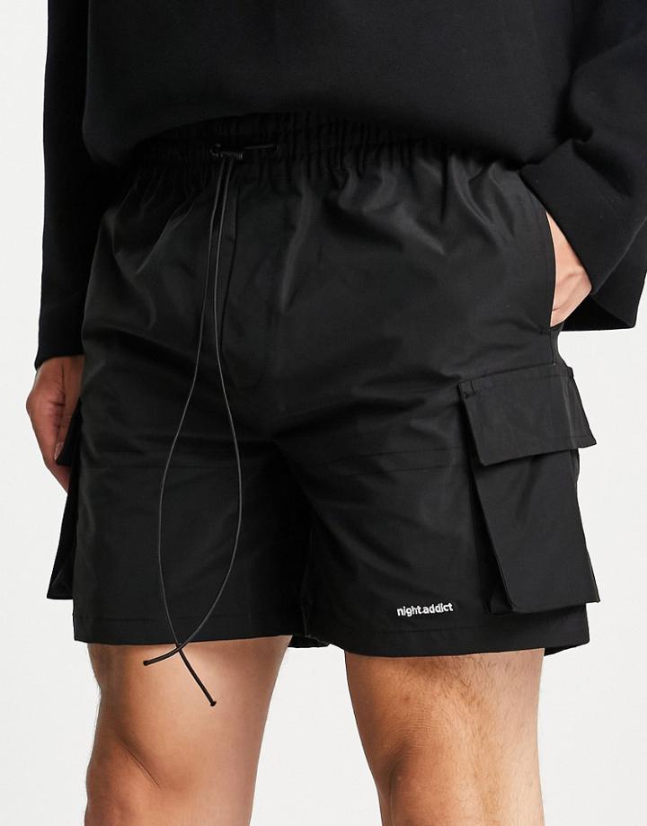 Night Addict Cargo Shorts In Black