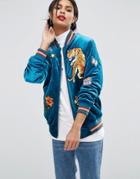 Asos Bomber Jacket In Velvet Quilt With Embroidered Badges - Green