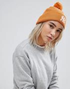 New Era Pom Beanie In Mustard Rib - Brown