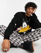 Asos Design Looney Tunes Daffy Duck Sweater In Black