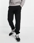 Asos Design Tapered Waffle Sweatpants In Black - Part Of A Set