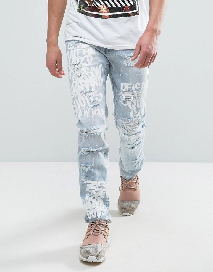 Reason Jeans In Light Wash With Distressing And Scribble Print - Blue