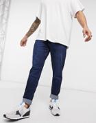 Ldn Dnm Carrot Fit Jeans In Dark Washed Indigo-blues