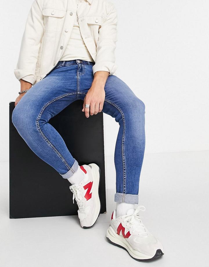 Don't Think Twice Carrot Fit Jeans In Mid Blue-blues