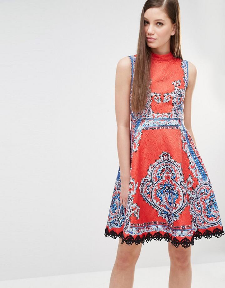 Comino Couture High Neck Skater Dress In Mutli Print With Stud Detail - Red Multi