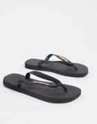Havaianas Metallic Logo Flip Flops In Black