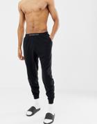 Abercrombie & Fitch Logo Waistband Cuffed Lounge Joggers In Black - Black