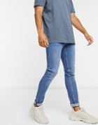 Ldn Dnm Skinny Fit Jeans In Mid Blue Wash-blues