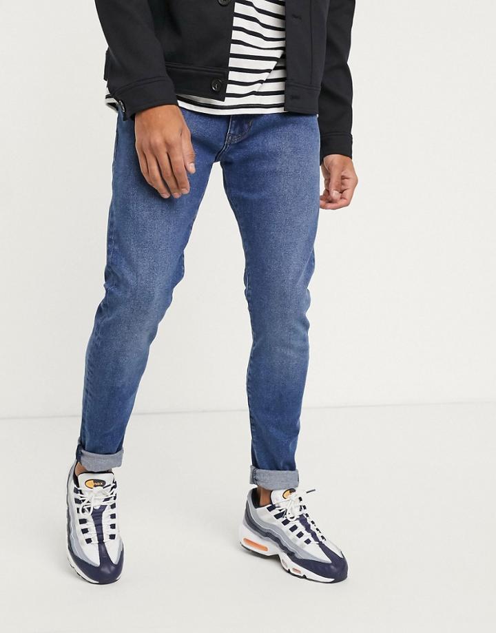 Wrangler Bryson Skinny Jeans In Mid Blue-blues