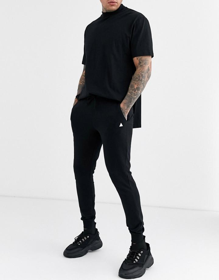 Asos Design Super Skinny Sweatpants In Black With Triangle