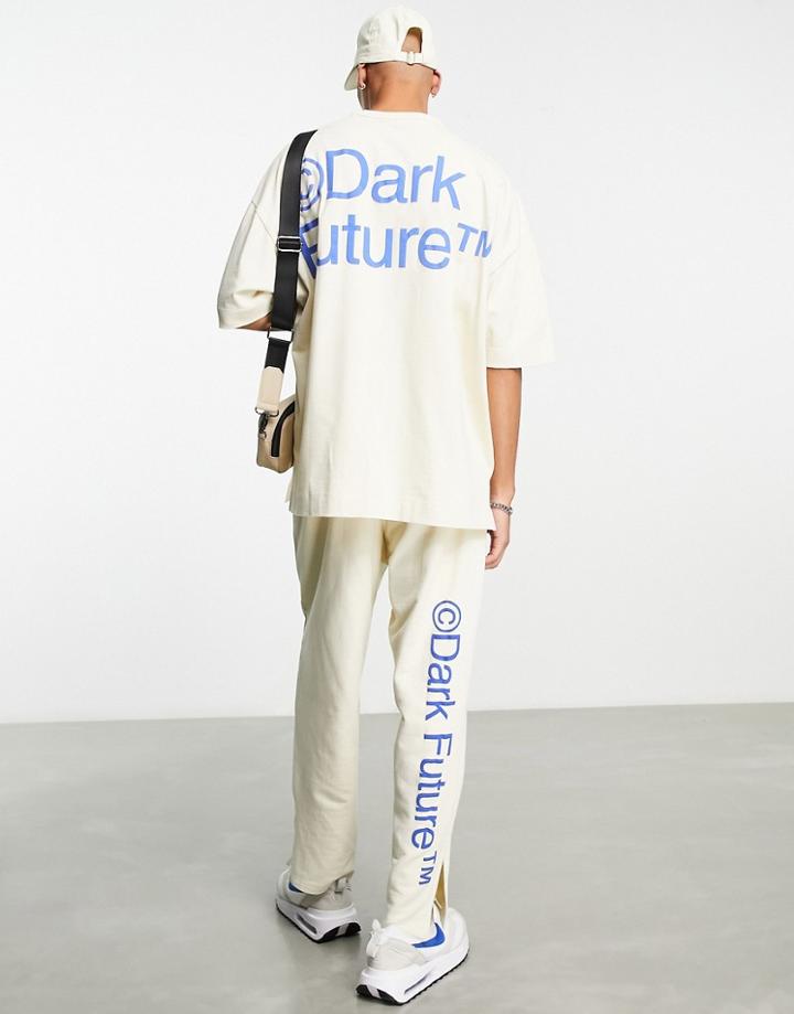 Asos Dark Future Relaxed Sweatpants With Side Slits And Logo Puff Prints In Off White - Part Of A Set