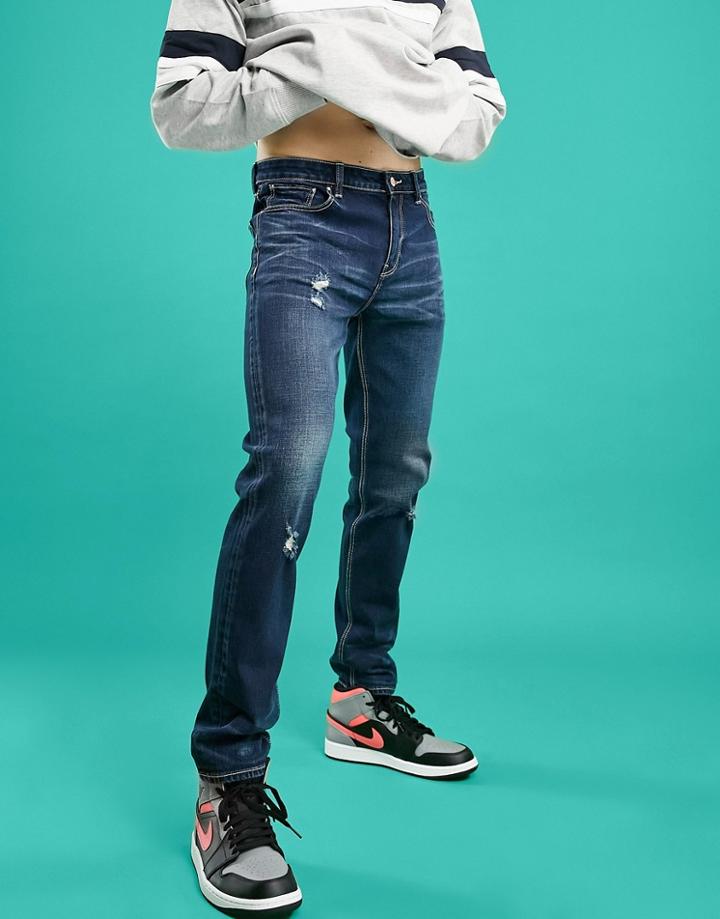 Asos Design Skinny Jeans In Dark Blue Vintage Japanese Wash With Abrasions-blues