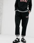 Karl Kani College Sweatpants In Black