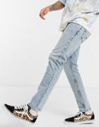 Asos Design Slim Jeans In Light Wash With Abrasions-blues