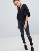 Parisian Skinny Jeans With Knee Rips And Raw Hem - Gray