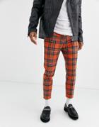 Twisted Tailor Tapered Cropped Pants In Orange Plaid