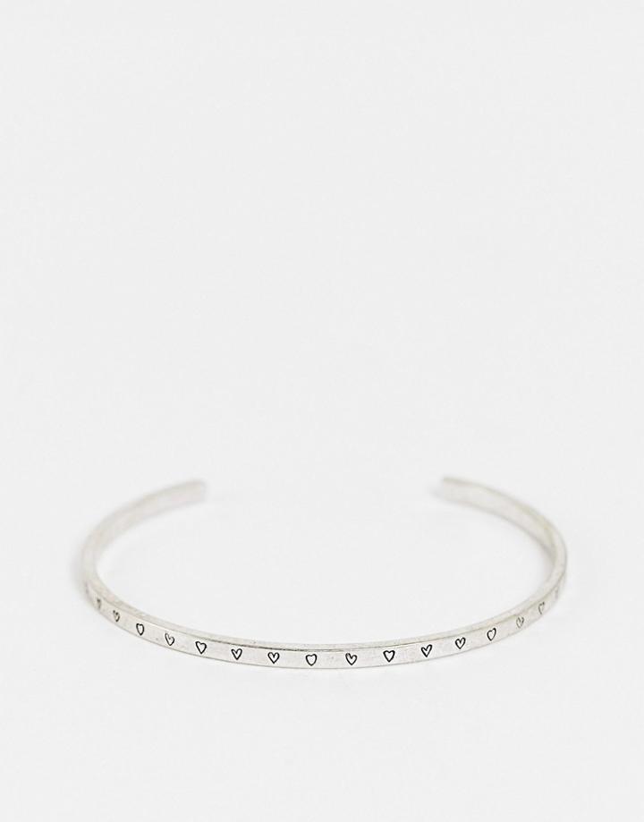 Asos Design Skinny Cuff Bracelet With Heart Detail In Silver Tone-black