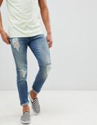 Asos Design 12.5oz Skinny Jeans In Mid Wash Blue With Heavy Rips - Blue